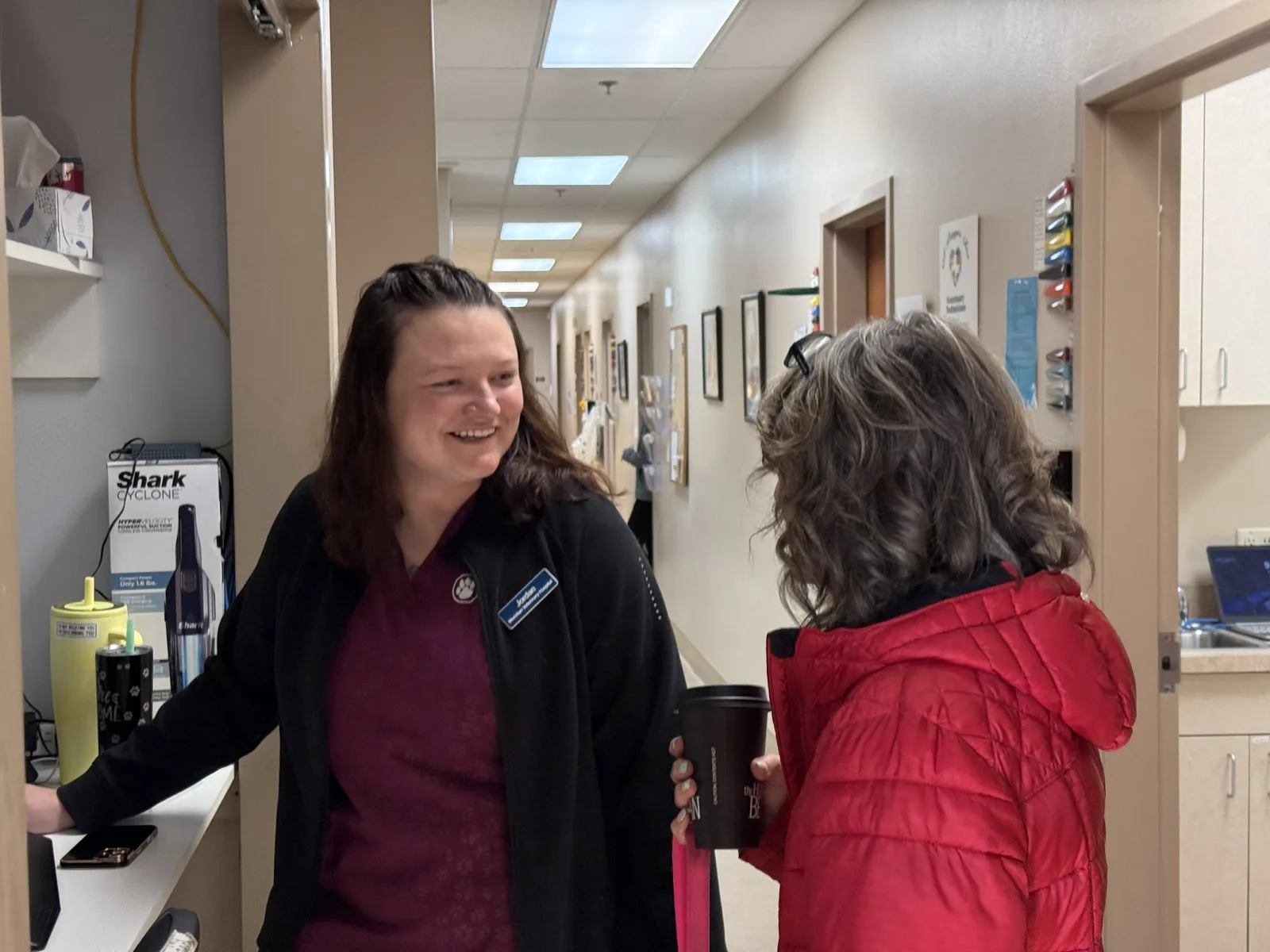 Meridian Veterinary Hospital team greeting a client